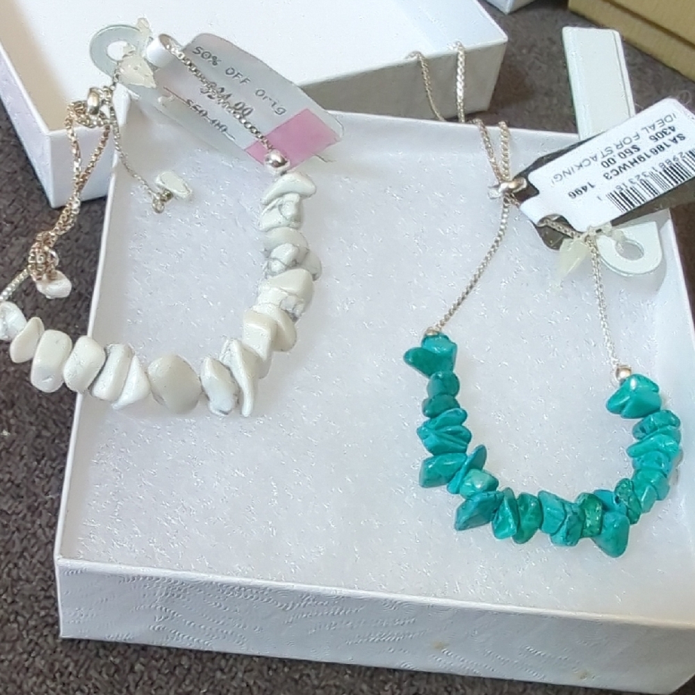 Two Stone Bracelets One Turquoise and A White Stone Adjustable.